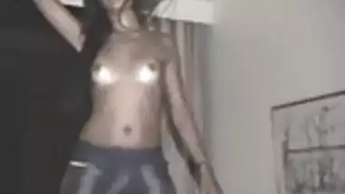 Pretty Indian girl dances and strips