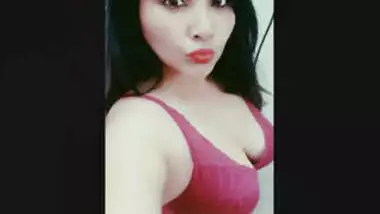 Indian sexy Actress Pressing Boobs and Showing Her Deep Cleavage