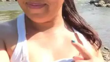 Horny whore pulls white top up to flaunt XXX shaped tits for Desi boys