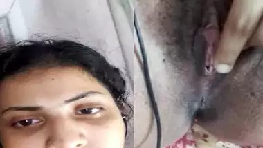 Indian fingering girl showing hairy pussy
